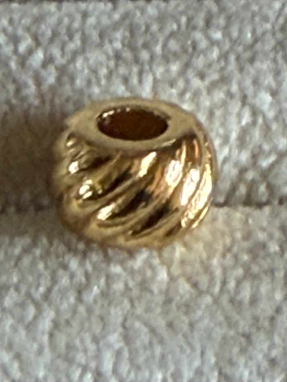 Brighton gold-plated "Rope & Roll" spacer bead.